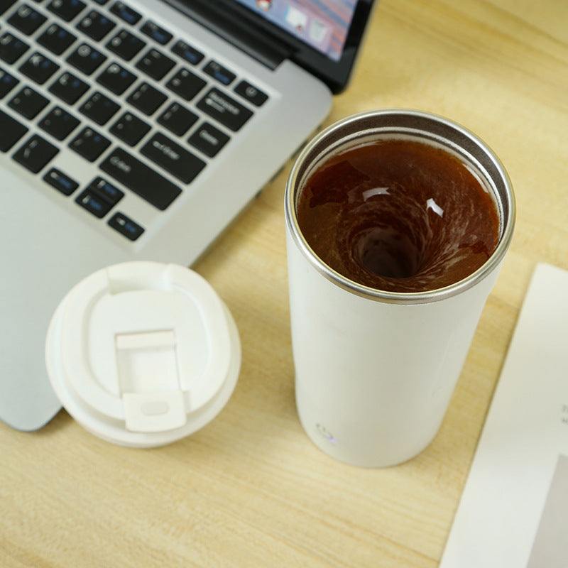 Magnetic Automatic Stirring Portable Coffee Mug Self Stirring Button On Lower Half And On The Side Of The Mug. Button Is A Digital Button