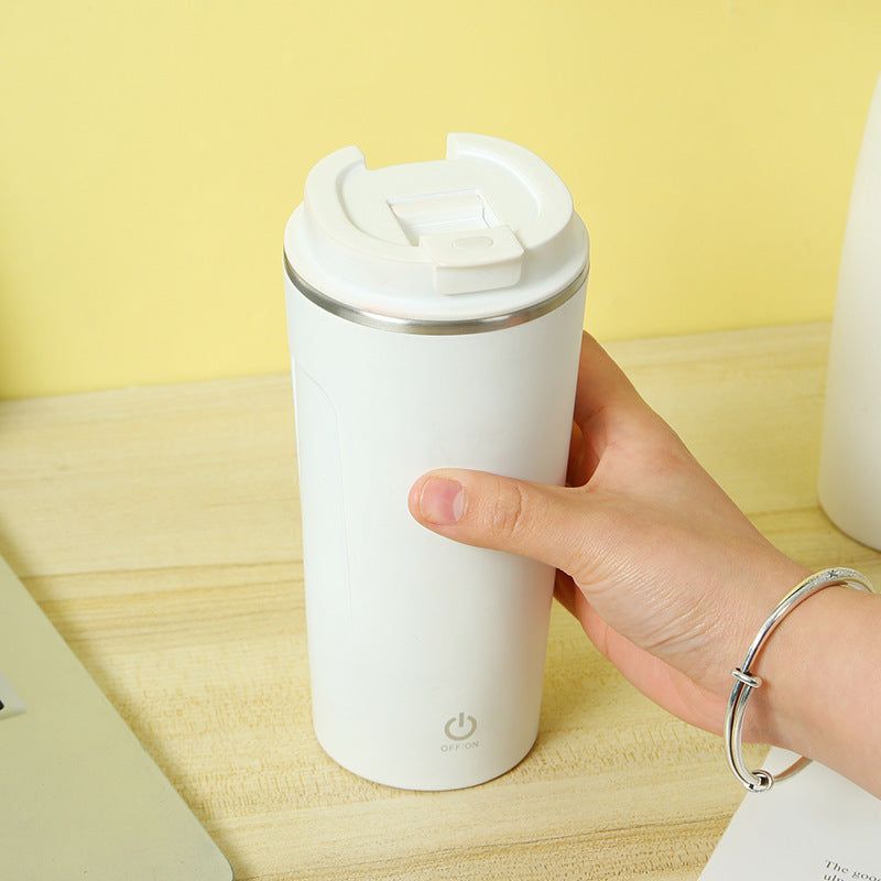 White Magnetic Automatic Stirring Portable Coffee Mug Self Stirring Button On Lower Half And On The Side Of The Mug. Button Is A Digital Button